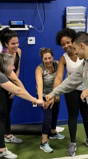 Velocity Sports Performance Norwood Group Huddle Hands In